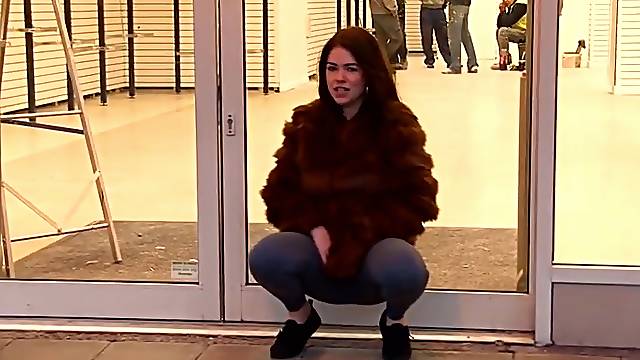 Public cameltoe and pissing show from a girl in fur