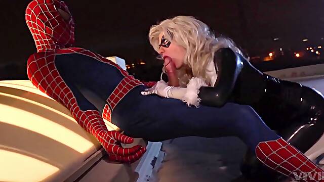 Aroused blonde whore goes wild on Spiderman's over sized dick