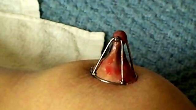 Nipple clamps and glowing wax
