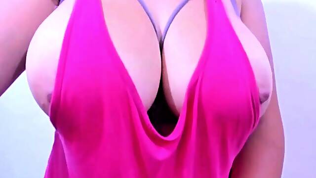 Latina in pink seduces me with her big tits