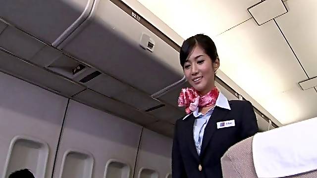 Japanese stewardess Nozomi Aso enjoys having sex with a pilot