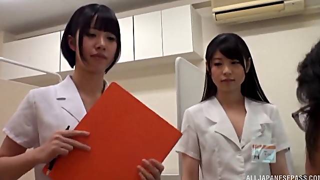 Lucky guy gets his dick pleasure by two Japanese babes on the floor