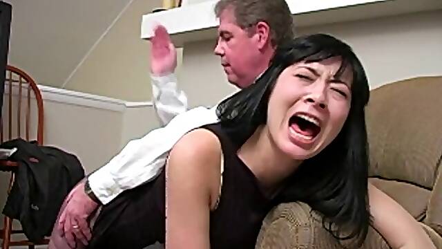Asian teacher spanked to tears
