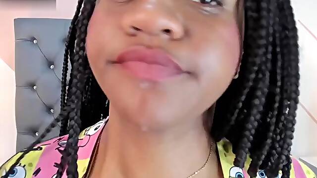 Tongue pierced ebony fetish tease spit close up