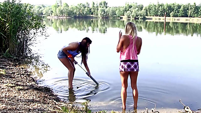 Pretty teens Cindy Loarn and Vanessa A make out by the water