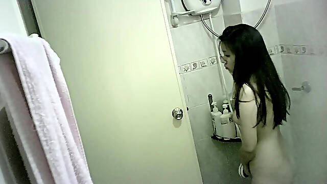 Voyeur spying on a beautiful Japanese girl in the shower