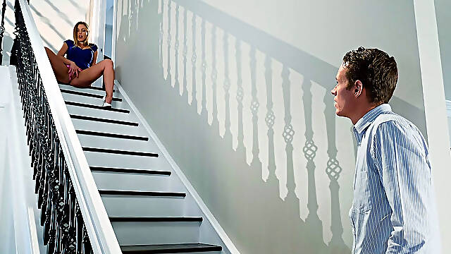 Blonde Britney Amber pleasuring herself on the stairs
