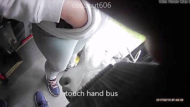 Pervert stealthily touches girls wrist in bus