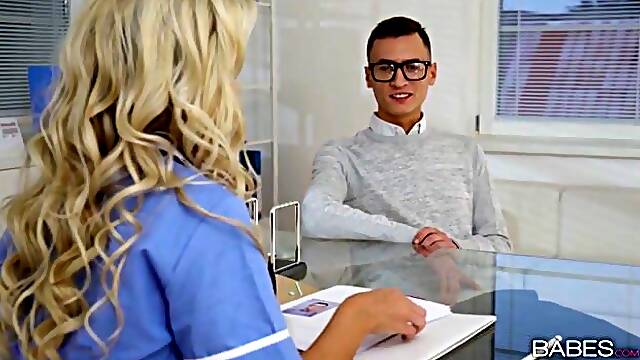 Get ready for a steamy visit to the doctors office with busty blonde nurse Lola. Watch as she...