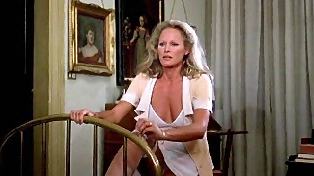 Experience the nostalgia of vintage cinema as the stunning Ursula Andress bares it all in this tantalizing celeb scene. Prepare to be captivated by the allure of these naked celebrities.