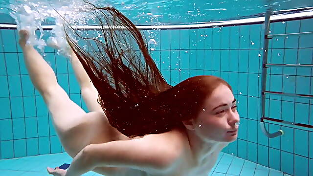Hot naked girls underwater in the pool