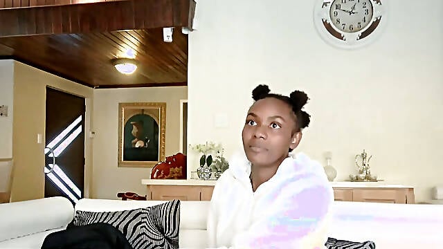 This AMATEUR EBONY 18YO fashionista held the pose... then droped her clothes and