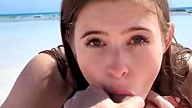 Slut sucks at the beach