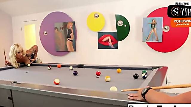 A light-haired girl enjoys a game of pool and completes with a cumshot