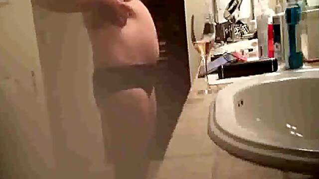 Busty Stepmom smoking, drinking and naked