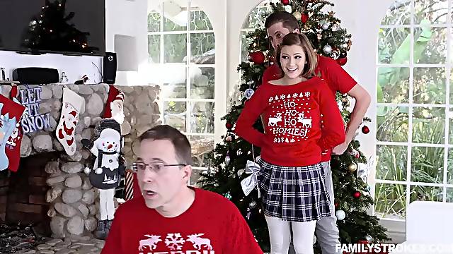 Gorgeous teen Riley Mae surprises her stepbrother with Christmas fuck