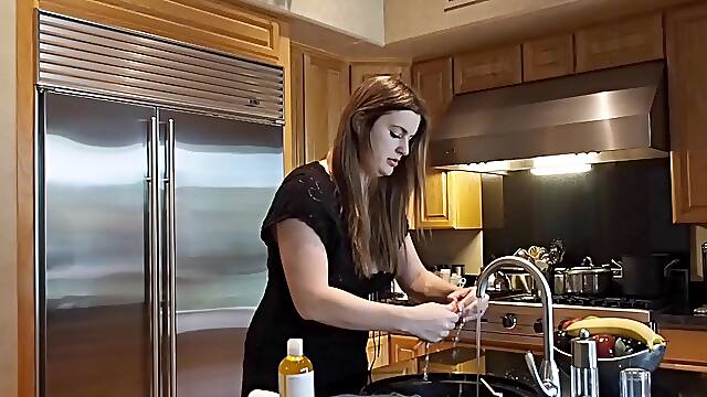 Carrots stuff the hot pussy of a big titty babe in the kitchen