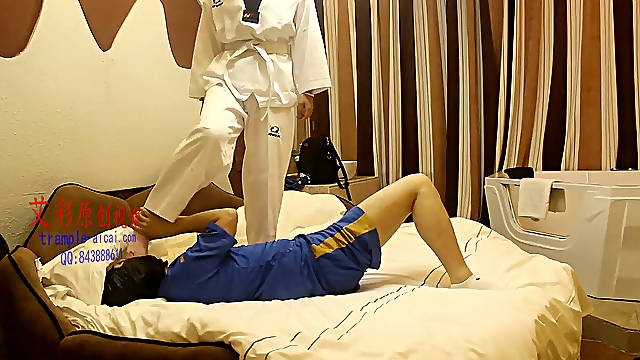 Taekwondo damsel kneeing and trampling