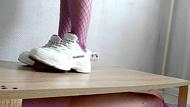 Footjob in white sneakers