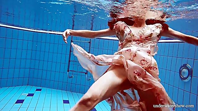 Spectacular Italian gal Martina underwater
