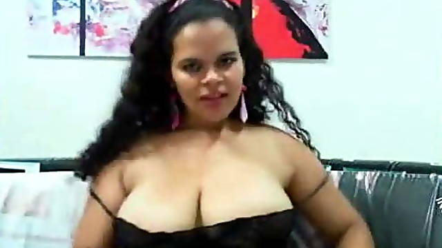 Busty Latina teases with big tits and pussy on cam
