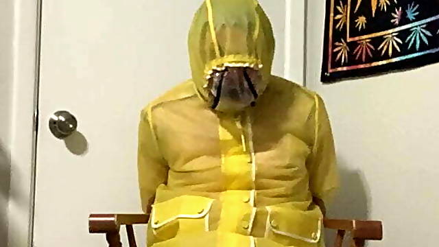 Yellow PVC raincoat bondage Part 2