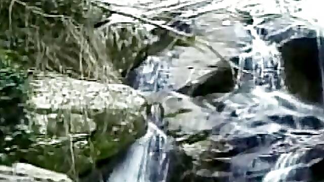 Vintage video of two hot guys having sex near river