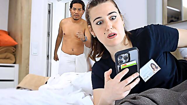 Latin boy catches the maid with his iPhone.