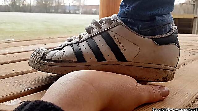 Finger trample with used adidas superstar