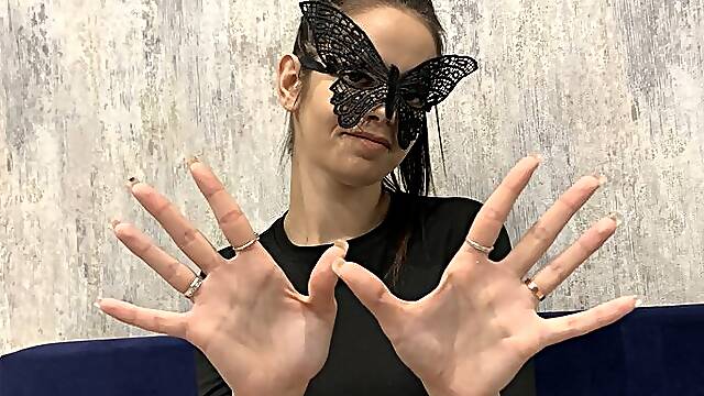 Model Polina measuring her big hands and comparing with male hands