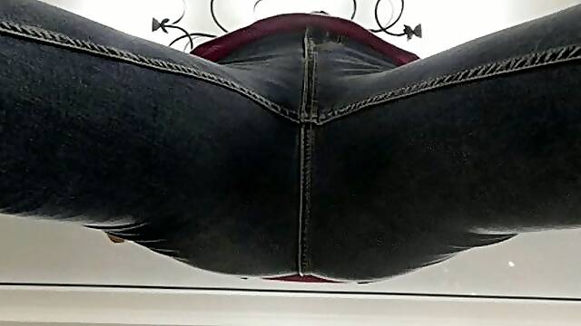 In tight jeans with legs spread apart and the camera MP4 HD 720