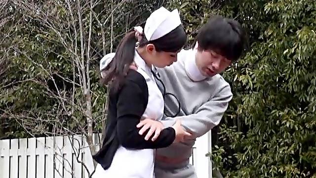 Japanese nurse sucking her patient's dick outdoors in the park