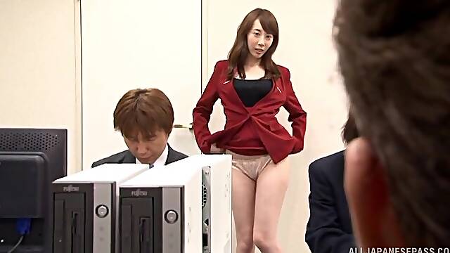 Clothed Japanese angel is ready for some wild fun at the office