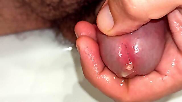 Close up Pissing and Playing with Peehole