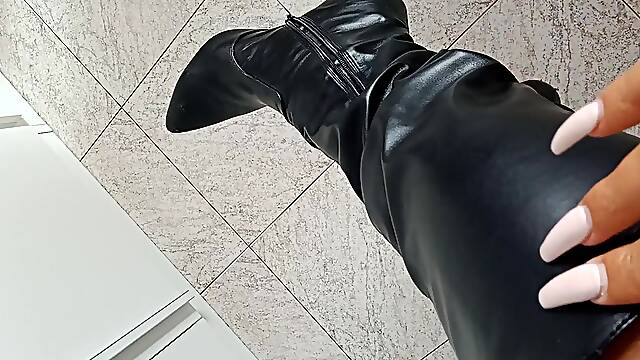 Playing with my black leather boots