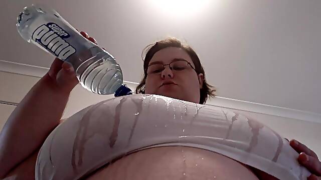 Big wet BBW titties in a tight white shirt and a bottle of water
