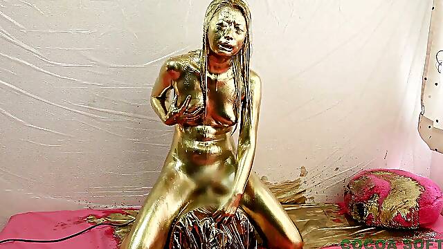 Experience Sybian in gold paint
