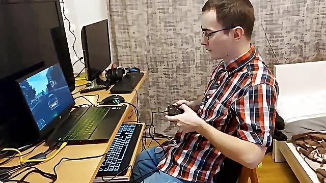 College Girl Interrupts Her Nerdy Classmate While He's Playing Video Games