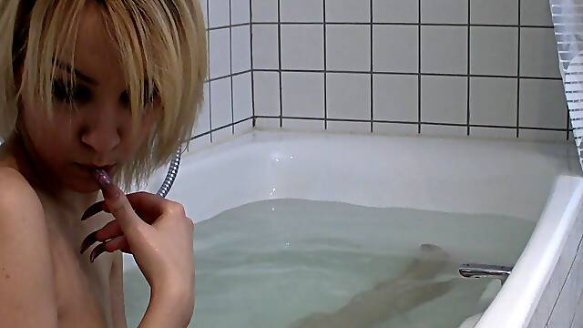 Lisa Takes a Bath with Her Laptop